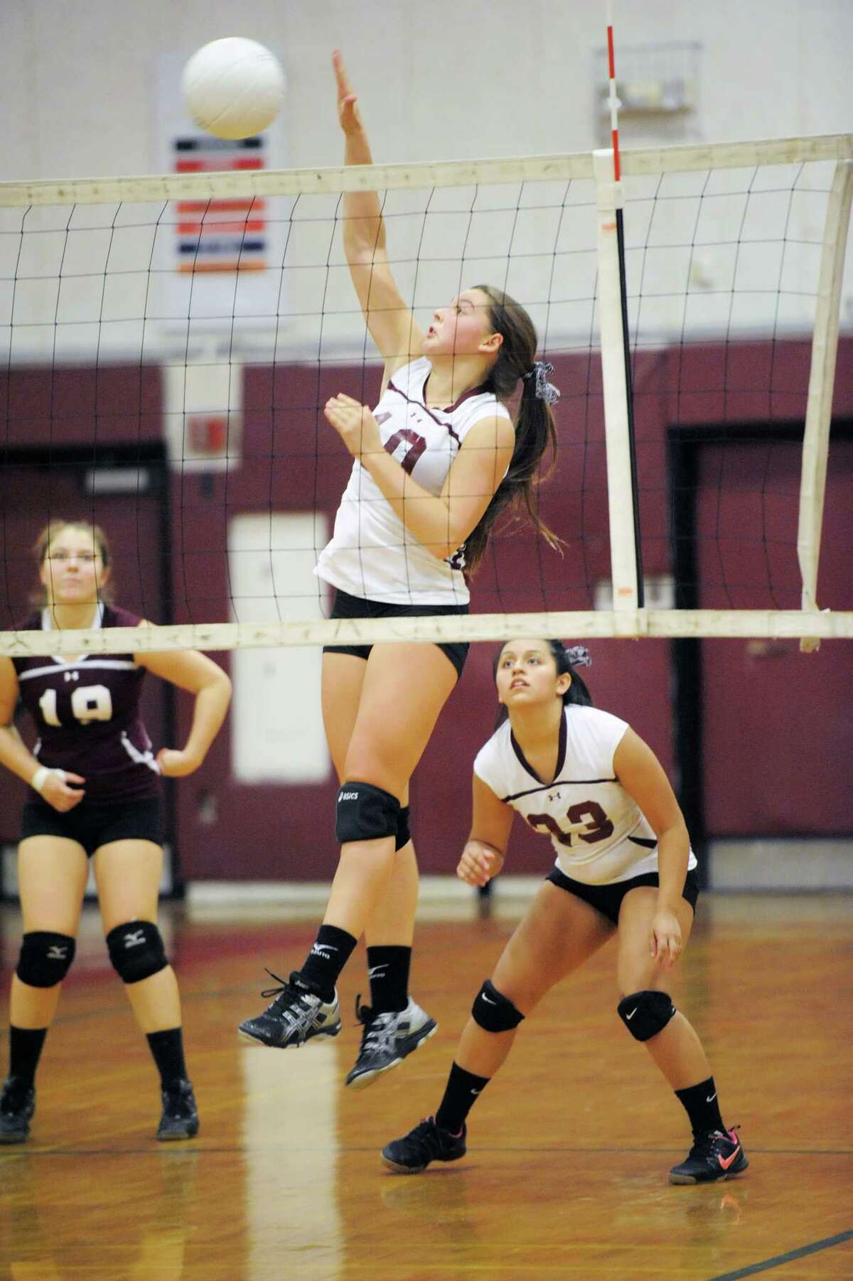 Torrington’s Samantha Zordan spikes the ball during the Red Raiders 3-0 victory against Watertown.
