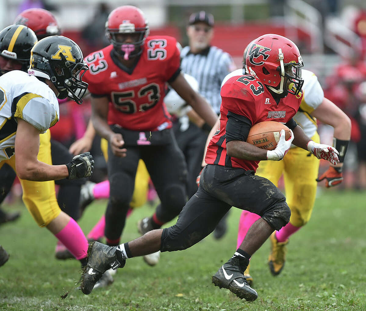 Stevie Swinson finds room to run in Wilbur Cross’ victory over Amity Oct. 24, 2014 at the Wilbur Cross Athletic Complex (Photo Peter Hivzdak – click for more)