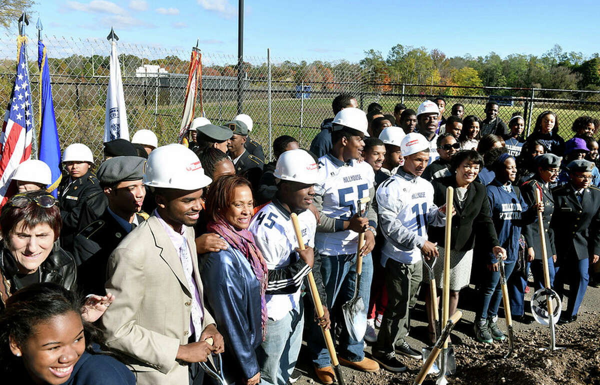 Hillhouse High School students and public officials pose for photographs at a ground breaking ceremony for Bowen Field in New Haven on 10/27/2014. (Arnold Gold-New Haven Register)