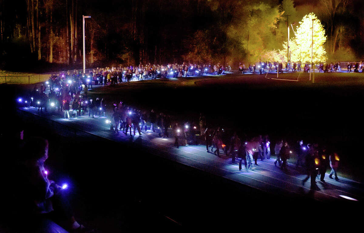 Seymour High School holds a walk of light vigil at the school’s football field and track Wednesday evening November 5, 2014 for Nina Poeta, the 17-cheerleader who just lost her battle with an inoperable brain tumor over the weekend. (Photo by Peter Hvizdak – New Haven Register)