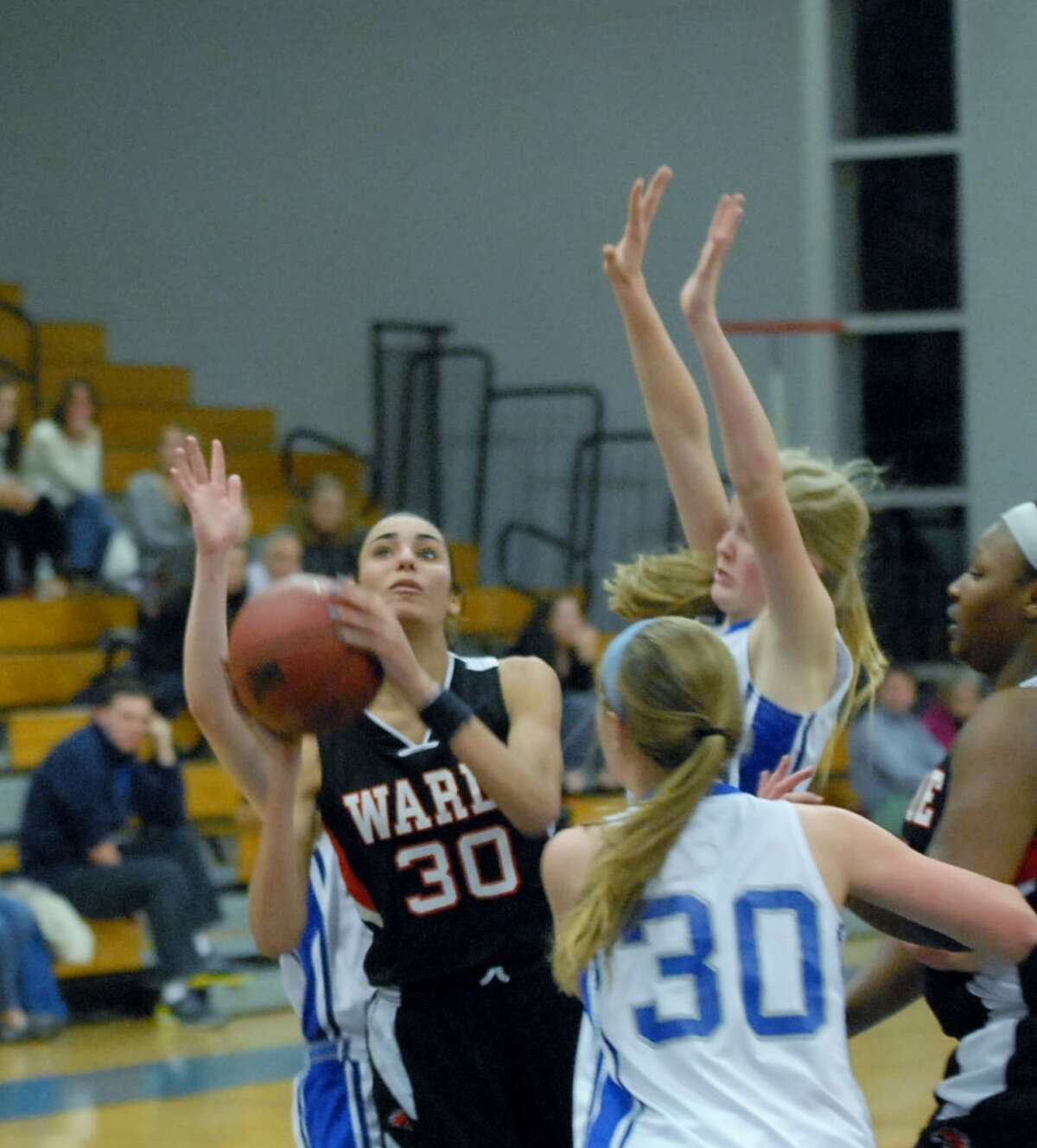 Warde’s Sarah Cotto goes up for a shot against Ludlowe Tuesday evening in the Todd Burger Tournament championship game. Photo by Mary Albl