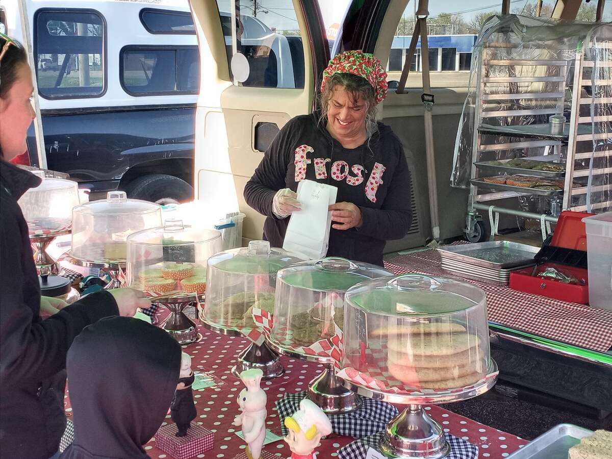 Kathleen McKeever, owner of Frost Bakery, packages a baked product for a customer. The East Alton Farmer's Market will occur 3-7 p.m. every Tuesday from April 19 through Oct. 25 in the parking lot of Eastgate Plaza, 625 Eastgate Shopping Center (near the AMC Eastgate Theater).
