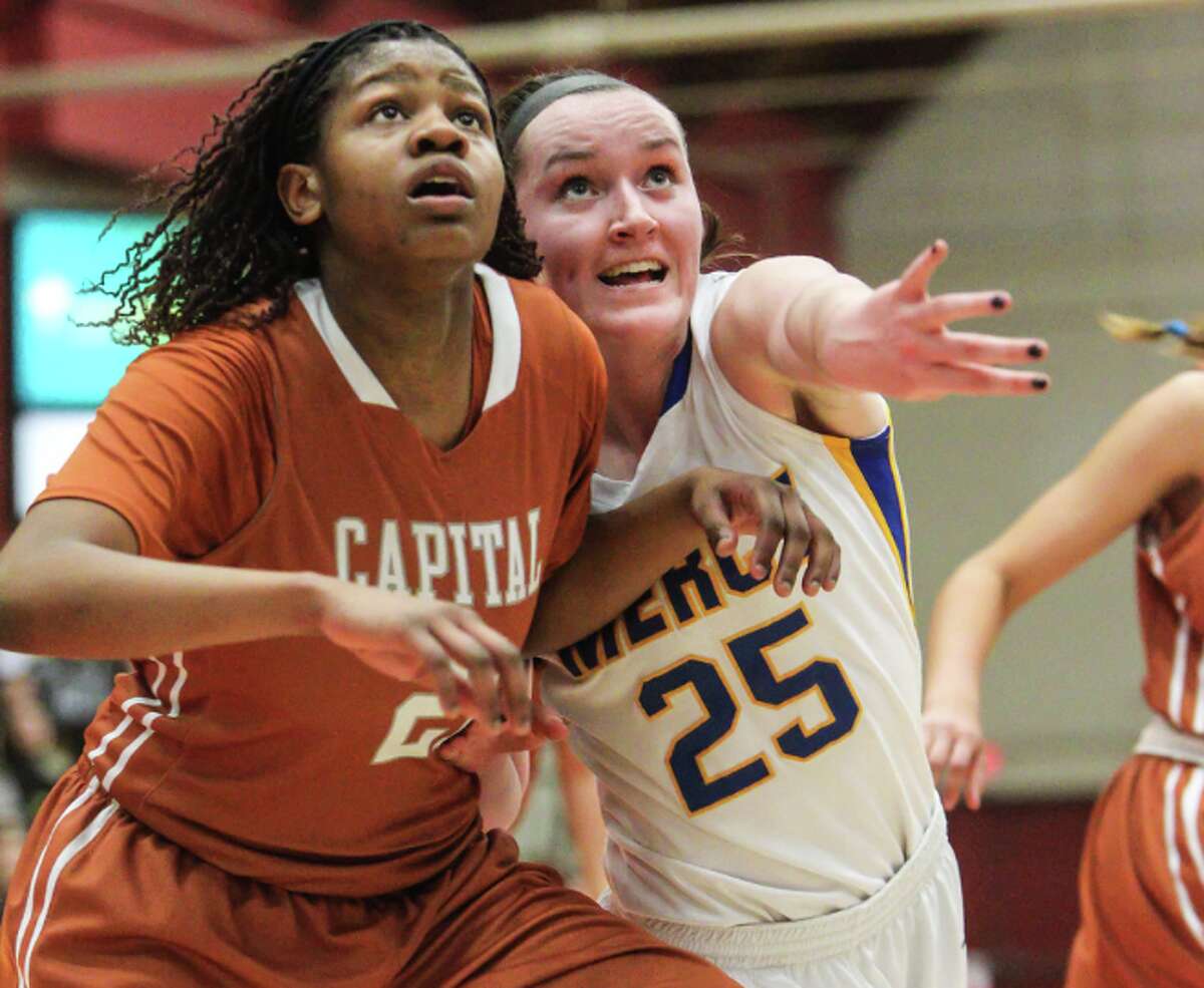 Capital Prep’s Desiree Elmore and Mercy’s Maura Fitzpatrick fight for a rebound in their meeting last month (Photo John Vanacore)