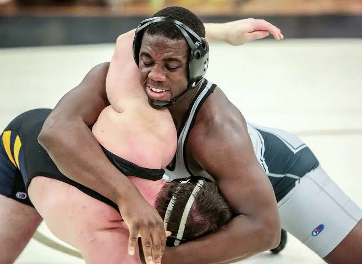 Class LL Wrestling Xaviers Broderick champ at 285, Falcons finish third; Newtown wins title photo pic