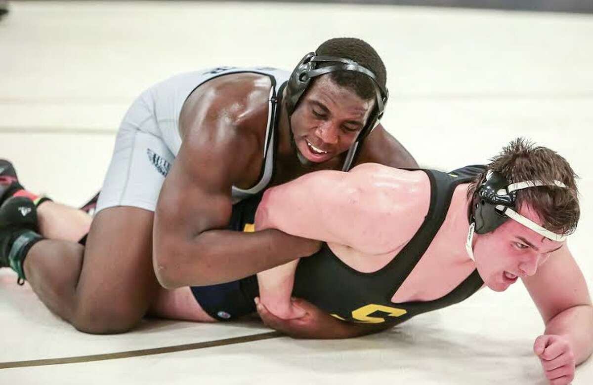 Class LL Wrestling Xaviers Broderick champ at 285, Falcons finish third; Newtown wins title image