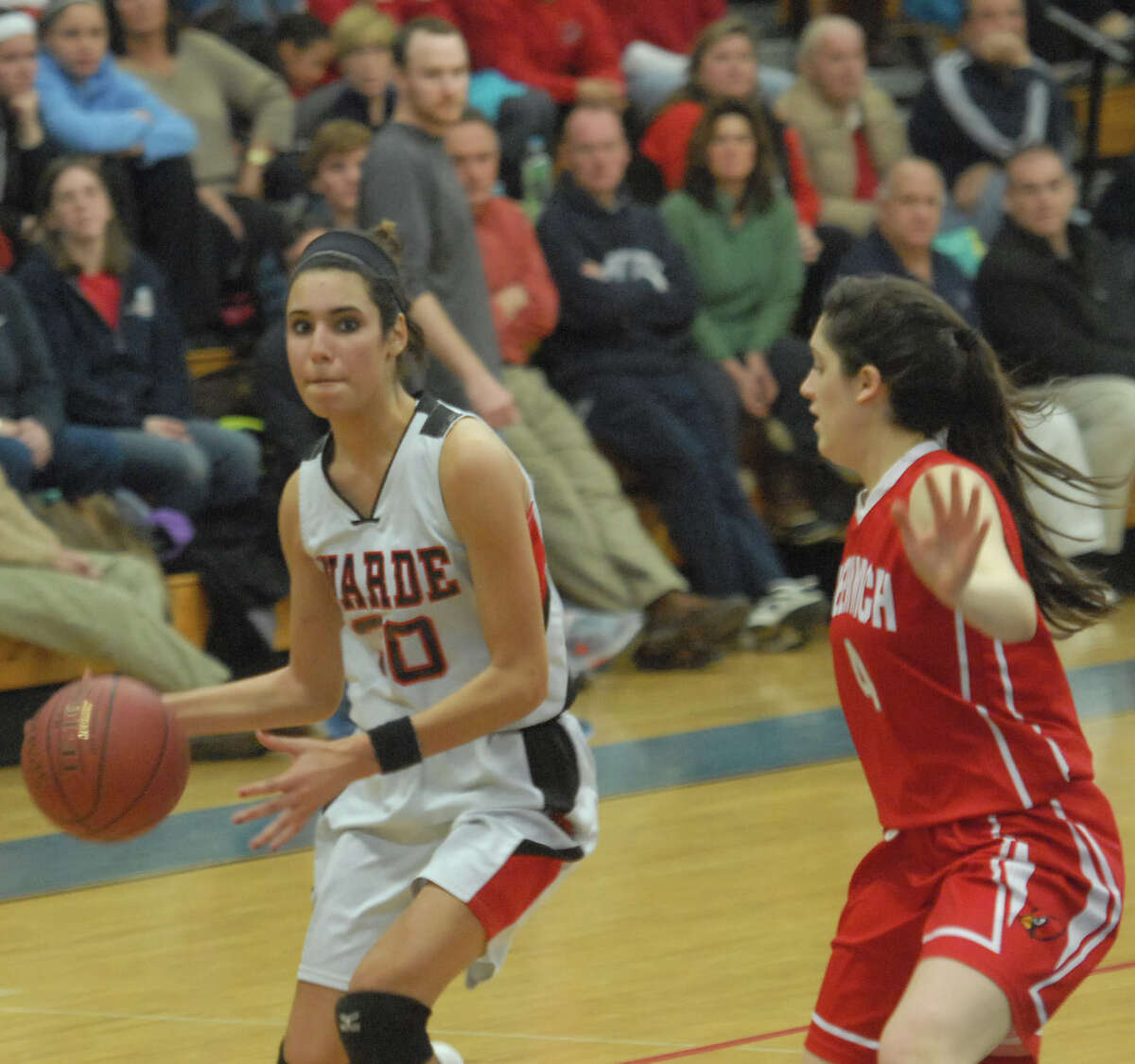Warde’s Sarah Cotto drives to the hoop against Greenwich Tuesday. Photo by Mary Albl