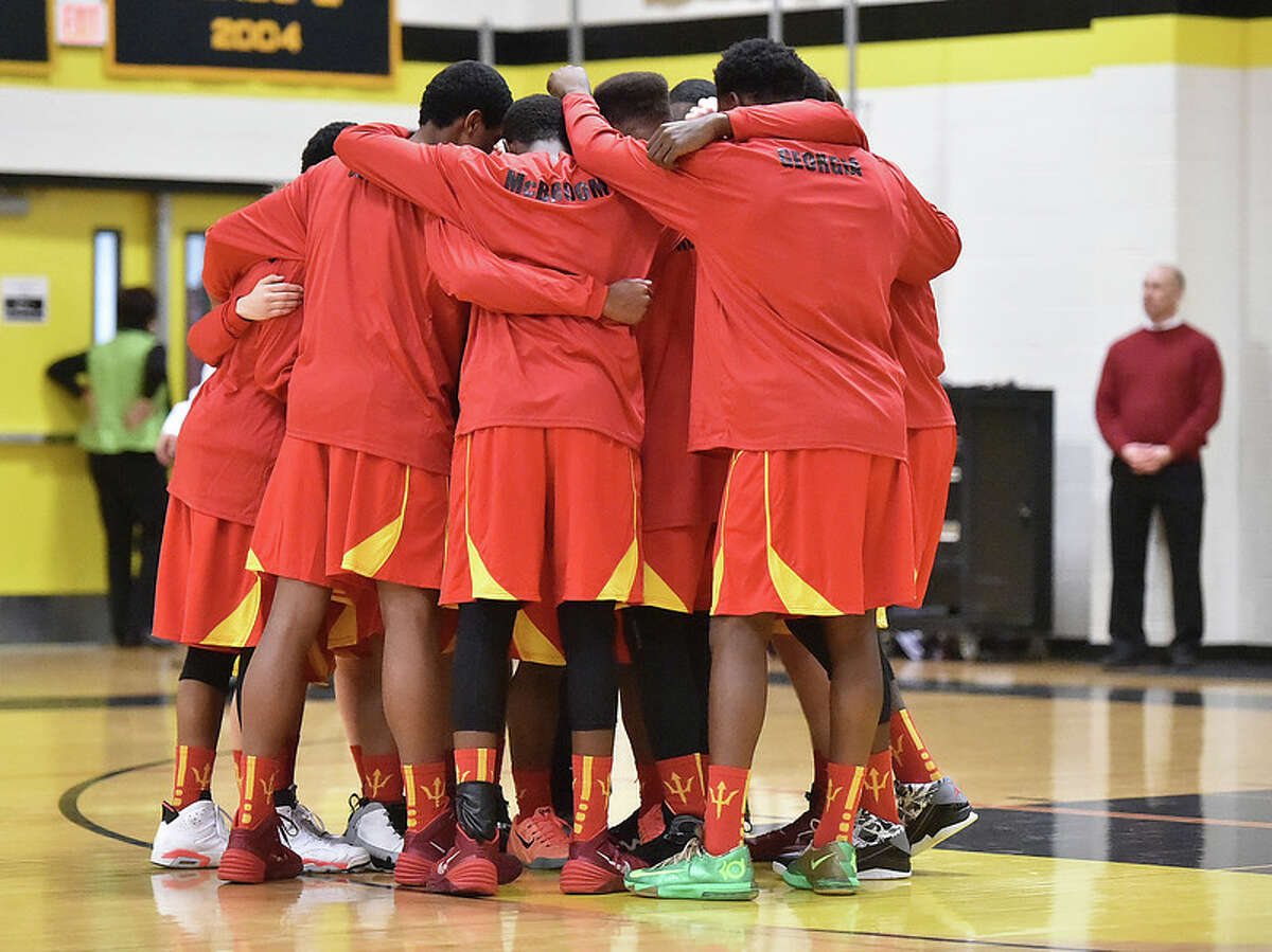 Stratford’s boys basketball team huddles up before a game earlier this season. The SWC tournament tips off Friday, Feb. 27 (Photo Catherine Avalone)