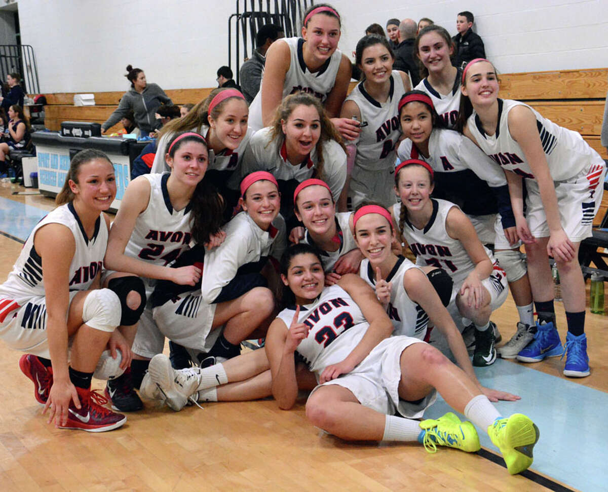 The Avon High girls basketball team is all smiles after winning their second straight NCCC Tournament title. (Gerry deSimas Jr. –