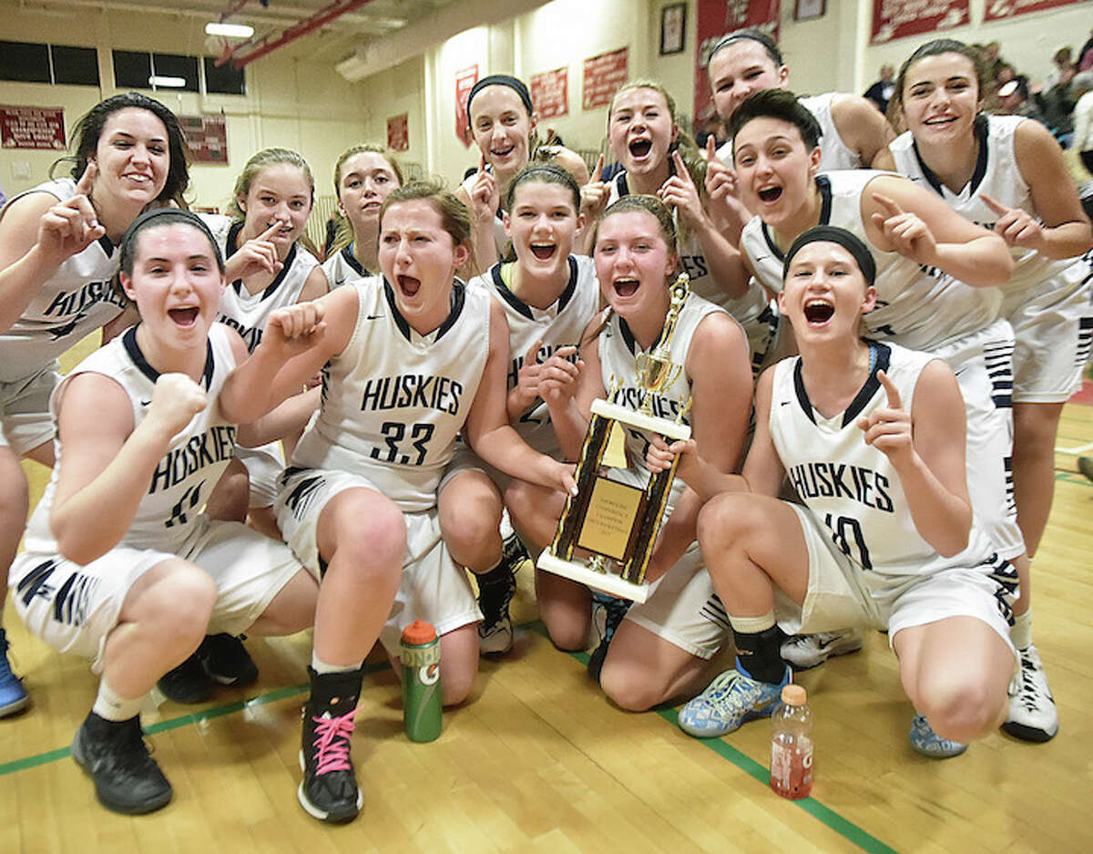 The Morgan Huskies defeated the Cromwell Panthers, 53-52, in OT, to win the Shoreline girls basketball championship, Friday night, February 27, 2015, at Wilbur Cross High School in New Haven. (Catherine Avalone/New Haven Register)