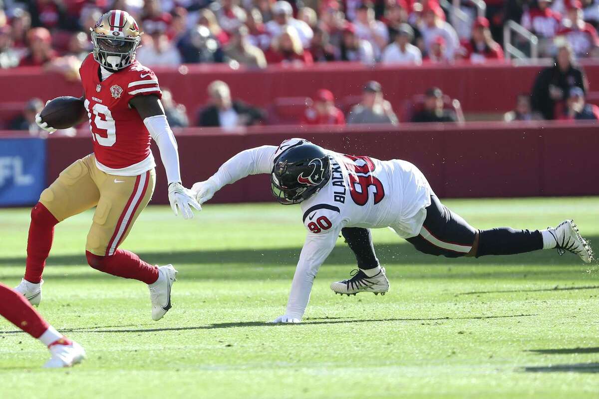 Could Texans defensive tackle and former second-round draftee Ross Blacklock (90), here pursuing San Francisco's Deebo Samuel in a matchup last January, be losing his grip on a roster spot?