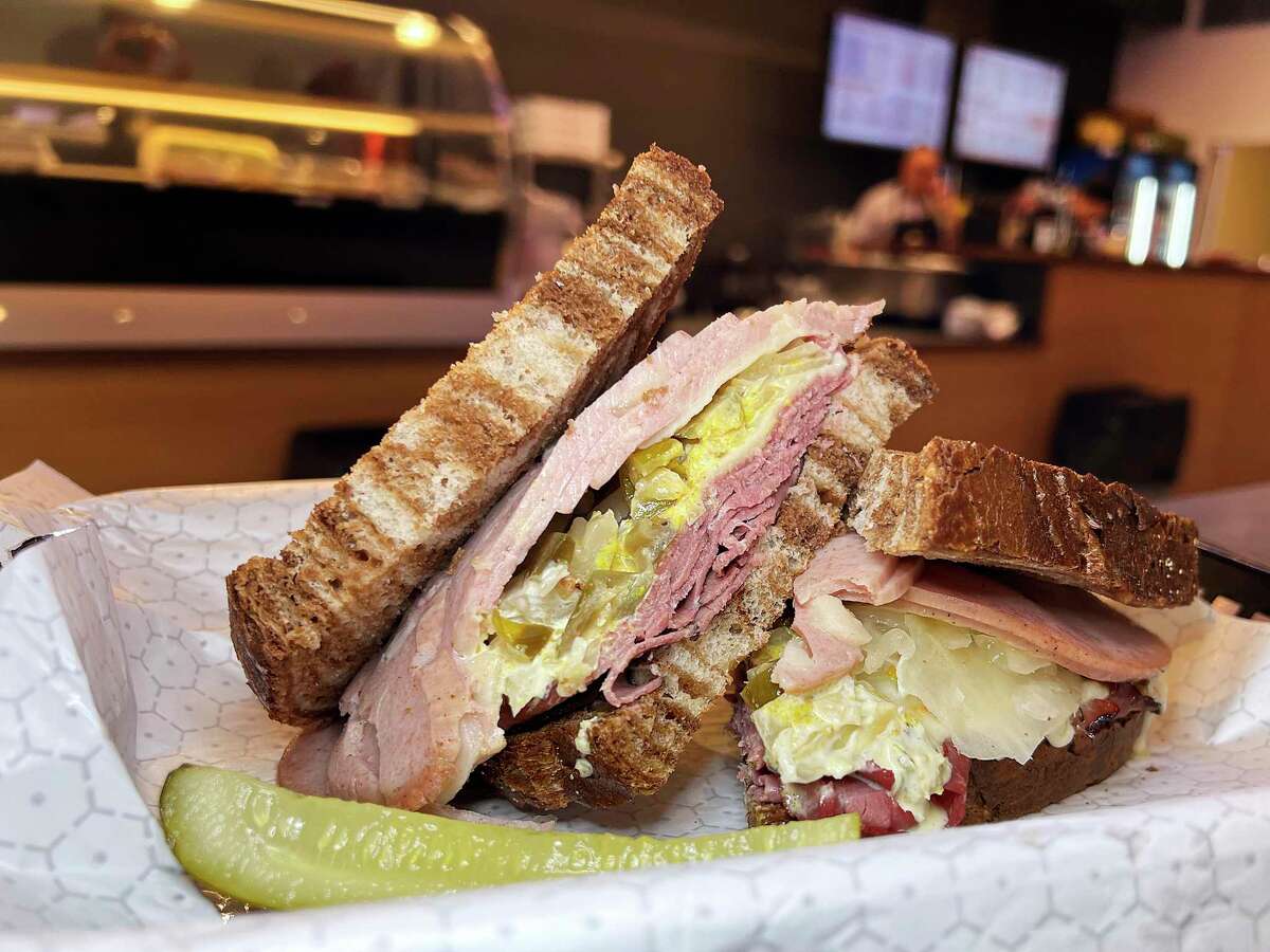 This build-your-own sandwich includes pastrami, mortadella, mozzarella, giardiniera and sauerkraut on marble rye bread at Broadway Delicatessen in downtown San Antonio.
