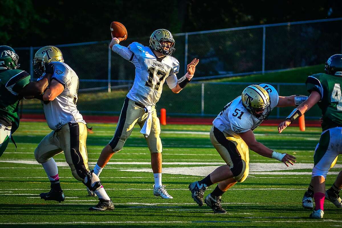 Trumbull quarterback Nick Roberts throws during the Eagles’ victory over Norwalk. Photo by Steve D’Amato / Trumbull Football