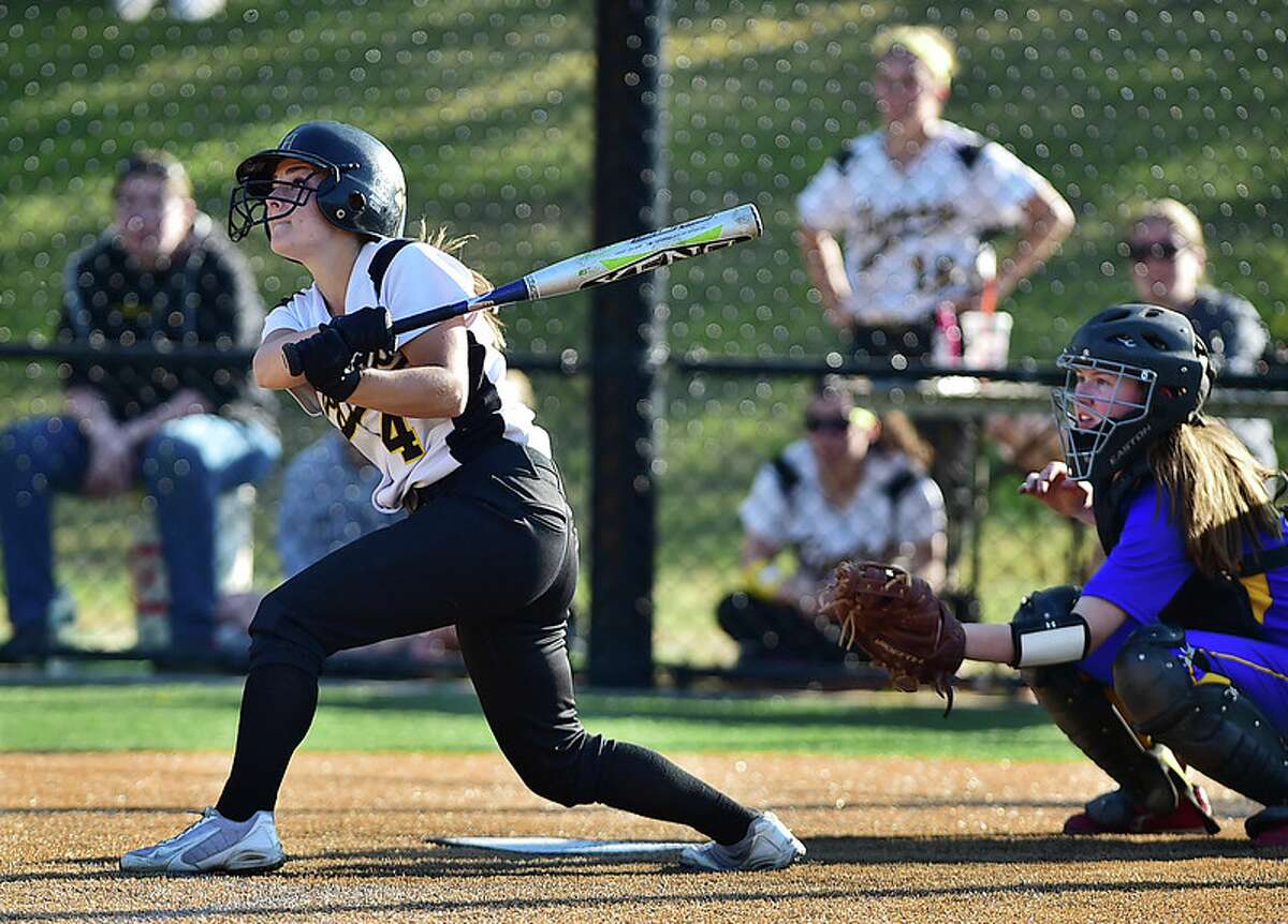 Softball action from Friday afternoon’s game in Madison. The Daniel Hand Tigers defeated the Mercy Tigers, 5-4, in eight innings, Friday, May 8, 2015. (Catherine Avalone/New Haven Register)