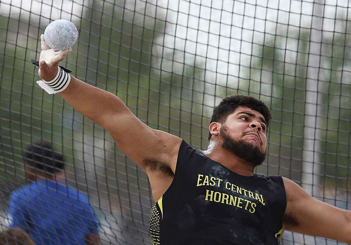 East Central's Michael Pinones competes in the shot put event as high school track and field athletes take part in the District 27/28-6A area meet at Heroes Stadium on Wednesday, Apr. 20, 2022. Pinones finished in first place.
