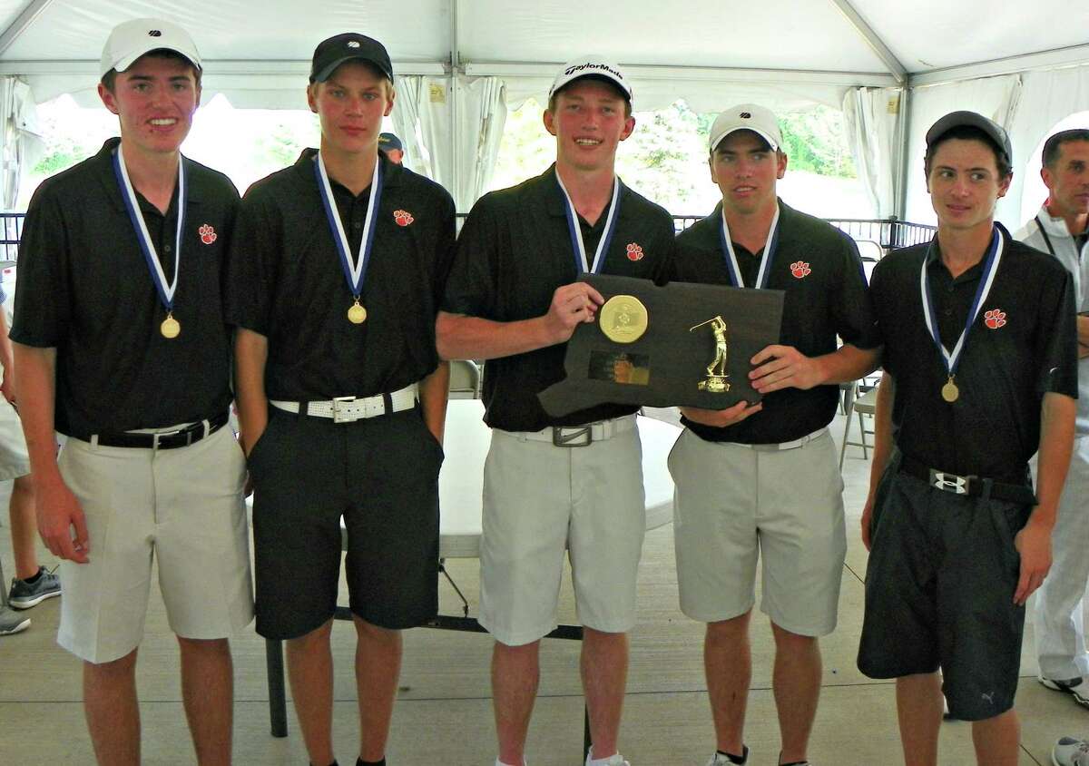 The Ridgefield boys golf team poses with the CIAC Division I championship trophy after shooting a combined 313 at Timberlin Golf Club in Berlin on Monday. Derek Turner-GameTimeCT