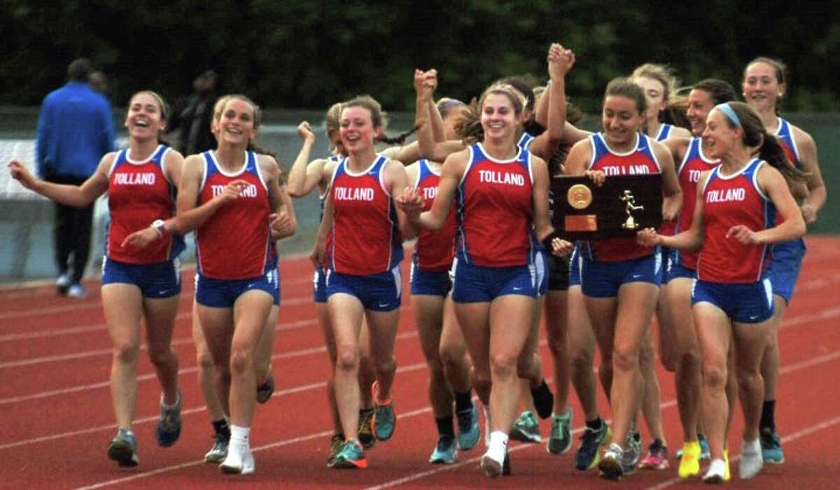 The Tolland girls celebrate winning the State Open title. Photo by Mary Albl