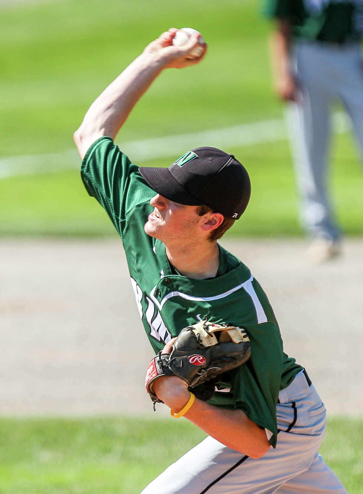 Freshman Luke Fox throws a pitch for Northwest Catholic during the Class S championship. Fox picked up the win in NWC’s first state title since 2010. (Photo John Vanacore)