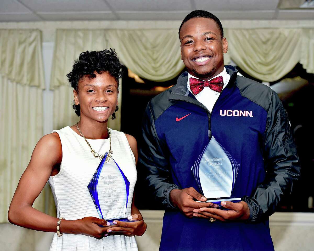 (Catherine Avalone – New Haven Register) Wilbur Cross senior runner Danae Rivers and Valley Regional senior quarterback Chris Jean-Pierre are the 2014-2015 recipients of the New Haven Register Athlete of the Year at the Annual MVP Banquet at Amarante’s Sea Cliff on Cove Street in New Haven.