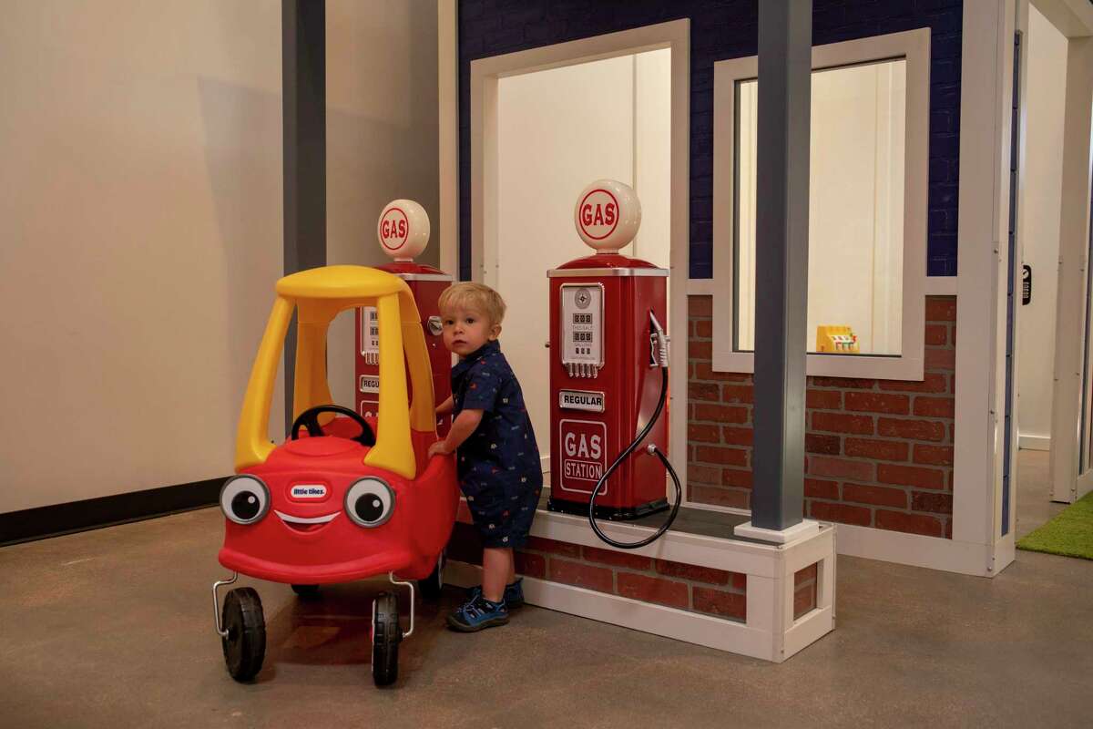 Bentley Tveit, 2, plays with the gas station at the Fredda Turner Durham Children’s Museum on Wednesday, April 20, 2022, at the Museum of the Southwest. Jacy Lewis/Reporter-Telegram