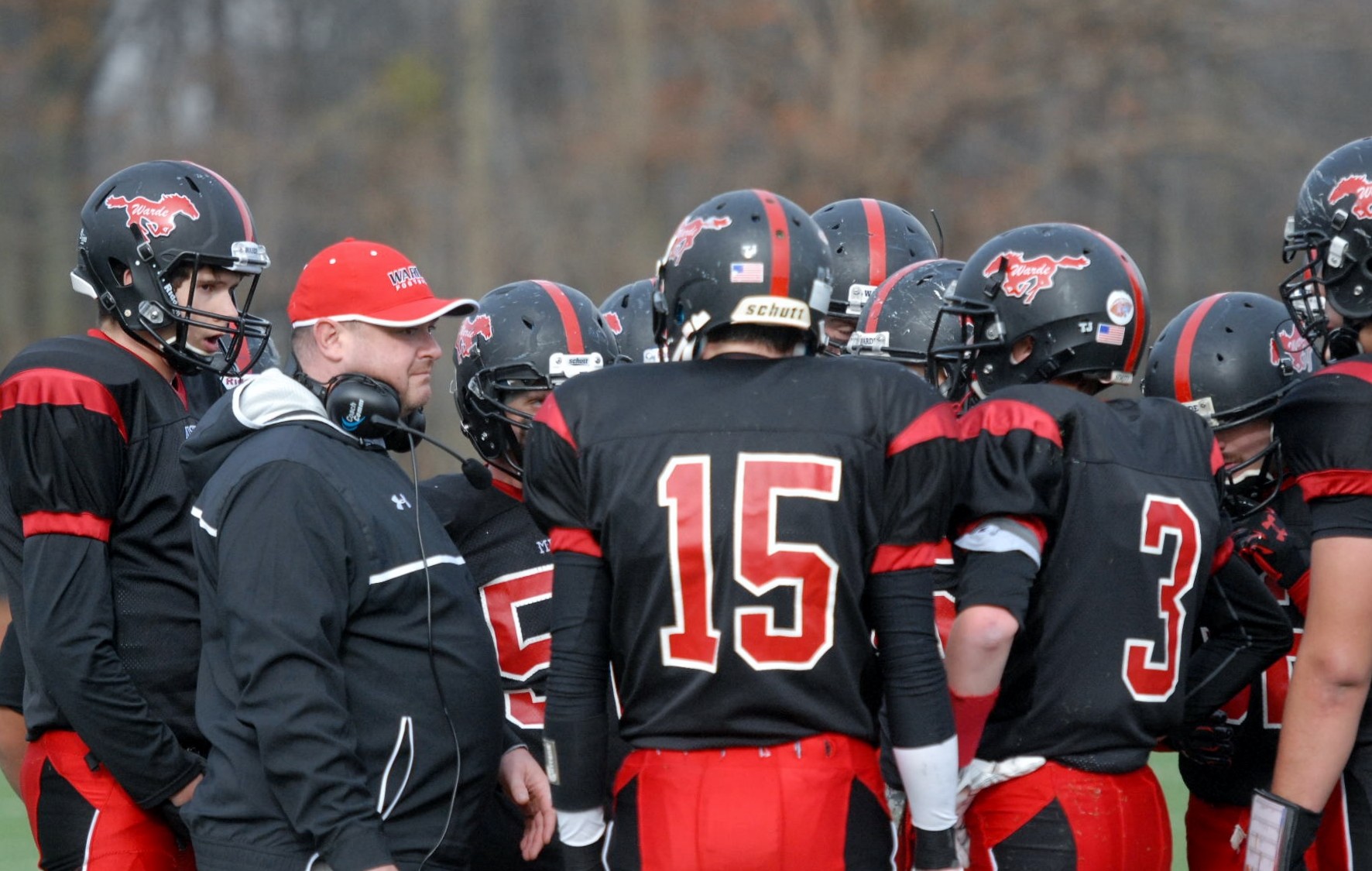 New Canaan football tops Warde for eighth victory