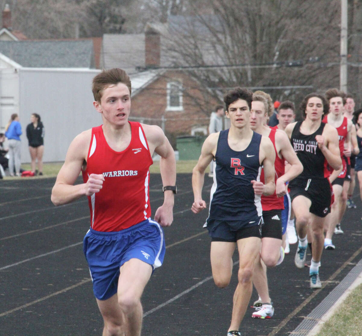 Chippewa Hills' Jake O'Neil maintains his lead in the 400 dutring track action last week.