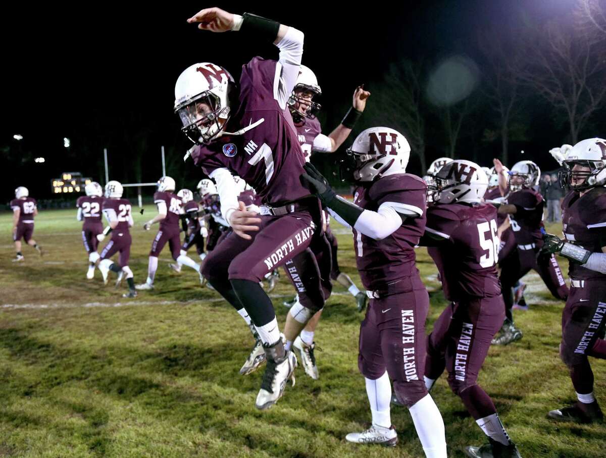 North Haven celebrates their victory over Wethersfield in the CIAC Class L semifinals. Photo by Arnold Gold.