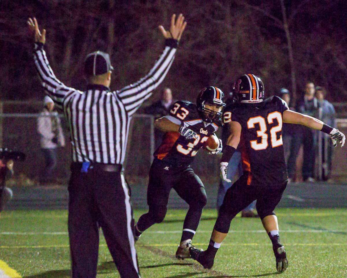 Action from Shelton’s 25-28 win over Newtown Monday evening. Shelton Advances to the Class LL Football Final.-John Vanacore/New Haven Register