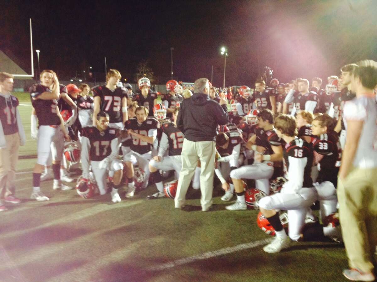 Joe Morelli/GameTimeCT New Canaan football coach Lou Marinelli addresses his team following the Rams’ Class L state semifinal win over Notre Dame-West Haven Monday night.