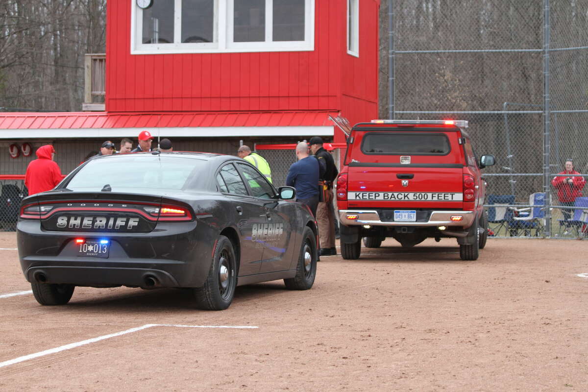 The Benzie County Sheriff's Office arrived on scene after a umpire collapsed during the first inning of a Huskies softball game. 
