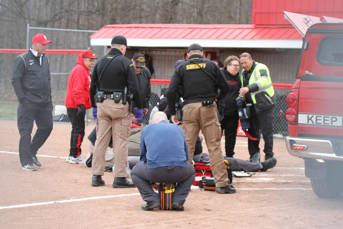 The Benzie County Sheriff's Department arrived on scene after an MHSAA umpire collapsed during the first inning of a Huskies softball game on Wednesday afternoon. 