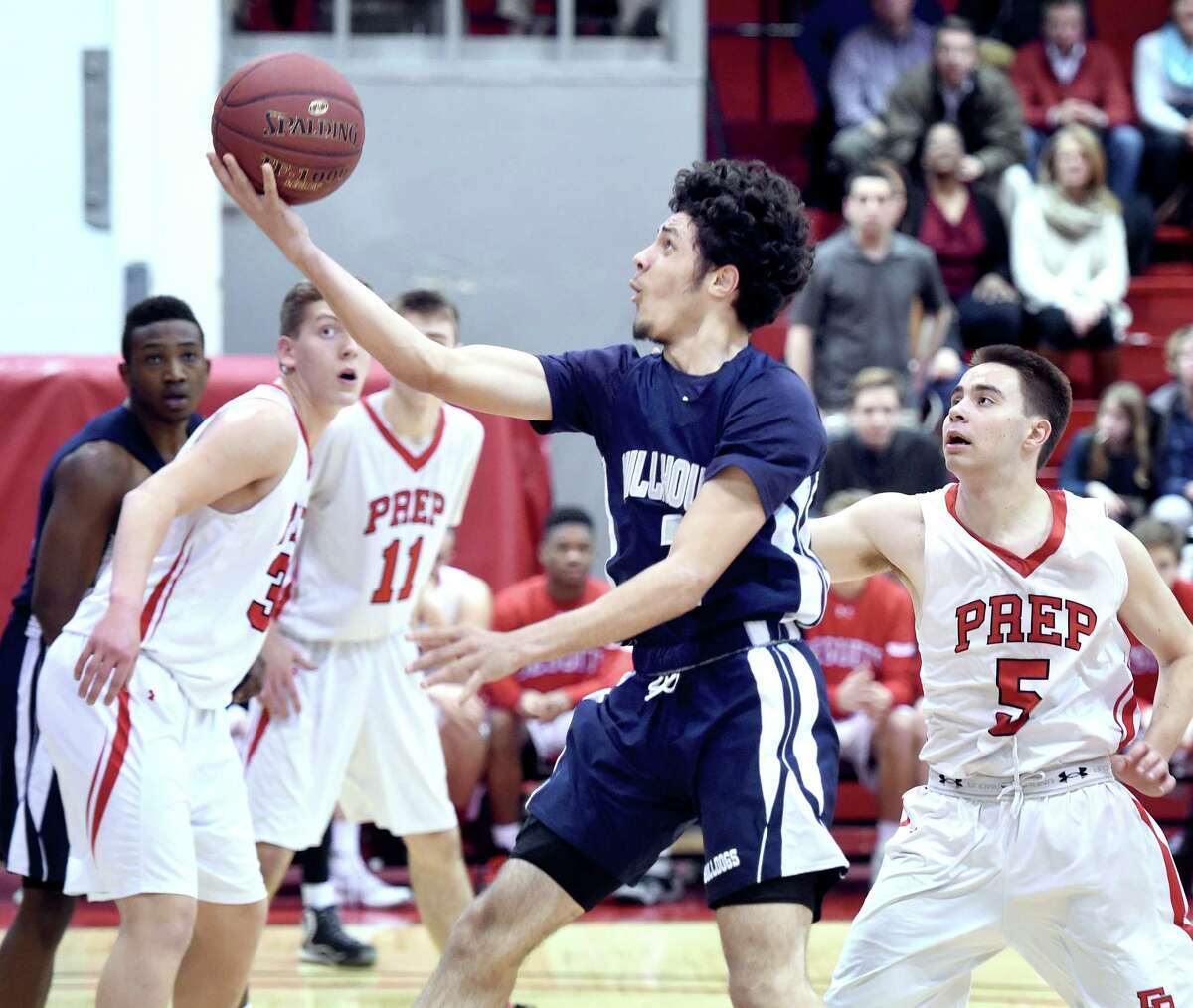 (Arnold Gold-New Haven Register) Joey Kasperzyk (center) of Hillhouse puts up a shot in the first half against Fairfield Prep in Fairfield on 1/29/2016. Hillhosue beat Fairfield Prep 44-40.