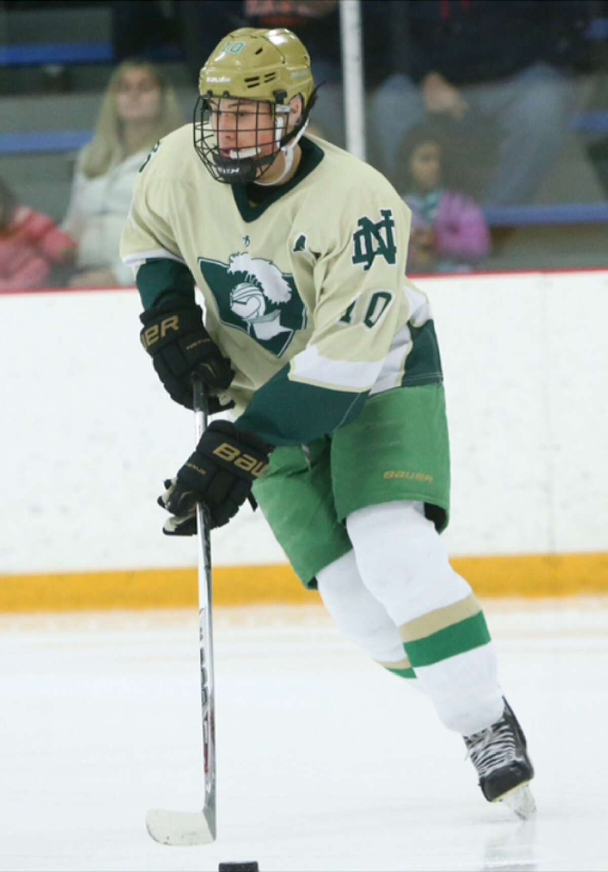 Photo — Notre Dame-West Haven. Notre Dame-West Haven defenseman Doug Caliendo scored the deciding goal 25 seconds into overtime in Notre Dame’s 3-2 win over Northwest Catholic Wednesday. Doug’s father died of cancer Wednesday morning.