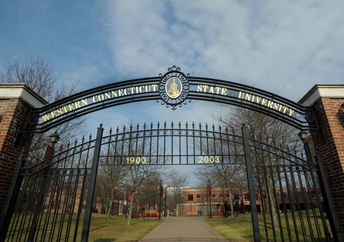 The entrance gates to Western Connecticut State University midtown campus at 181 White St. in Danbury. A report has found the university in “serious financial difficulty” and blames spending.