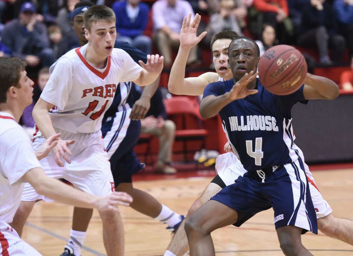 Hillhouse’s Tyler Douglas looks to pass in the Academics’ 44-40 victory over Fairfield Prep in January. The two teams meet for the SCC tournament title Wednesday. Photo by Arnold Gold/New Haven Register.