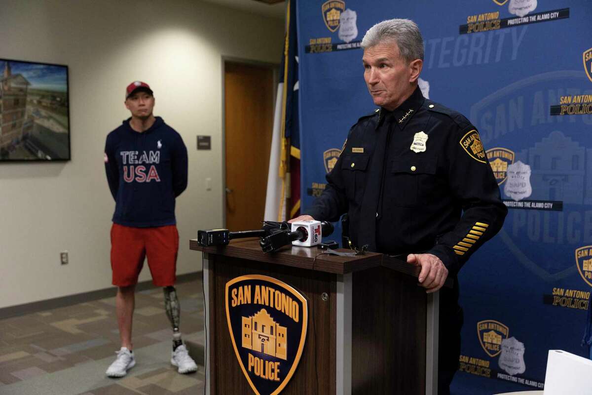 San Antonio Police Chief William McManus and Paralympian Jen Lee speak at a news conference on Wednesday after McManus was able to return the gold medals that Lee won as a member of the U.S. sled hockey team. The medals were stolen from Lee’s car on Saturday.