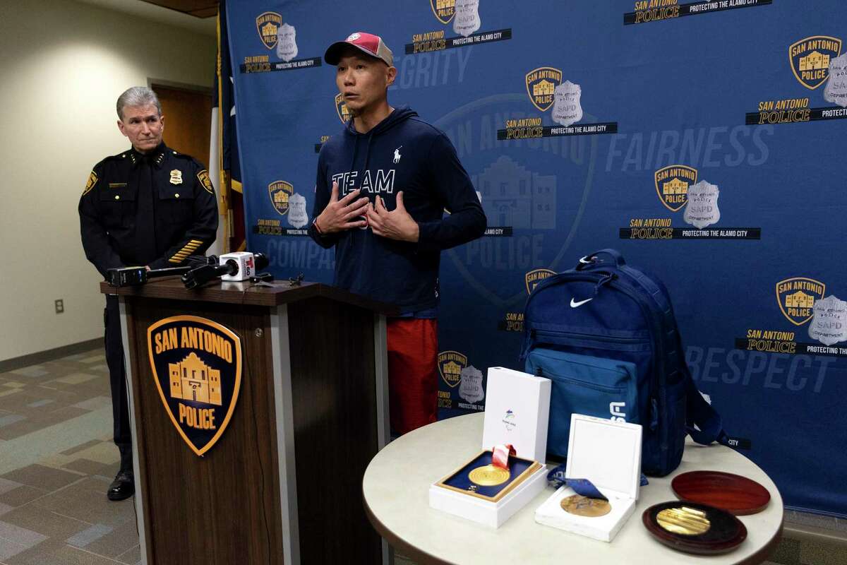 San Antonio Police Chief William McManus and Paralympian Jen Lee speak at a news conference on Wednesday after McManus was able to return the gold medals that Lee won as a member of the U.S. sled hockey team. The medals were stolen from Lee’s car on Saturday.