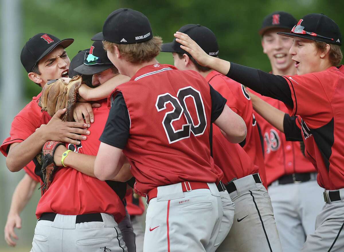 Northwester celebrates after defeating Sheehan, 6-1, Tuesday, June 7, 2016, in the CIAC 2016 Class M semifinal game at Sgt. John Zipadelli Field at Sage Park in Berlin. The Titans are the 2015 Class M defending champion. (Catherine Avalone/New Haven Register)
