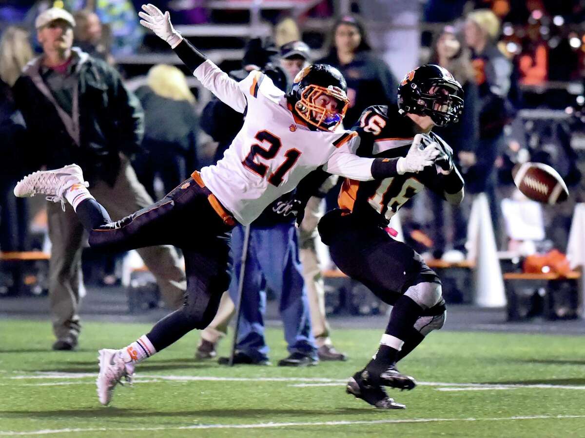 Cornerback Luke Gaydos of Ridgefield H.S. knocks down a pass intended for wide receiver Anthony Schiavo of Shelton H.S. during second quarter Class LL Semifinal football at Shelton H.S. Monday evening, December 5, 2016. (Peter Hvizdak – New Haven Register)