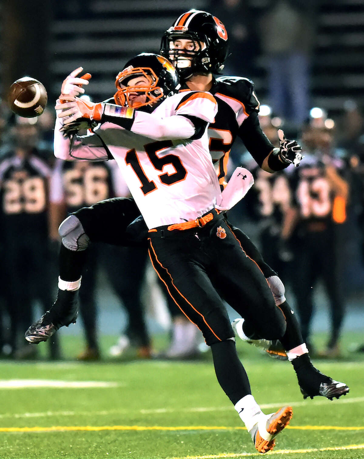 Defensive back Aidan Spearman of Ridgefield H.S. knocks down a pass intended for wide receiver Anthony Schiavo of Shelton H.S. during second quarter Class LL Semifinal football at Shelton H.S. Monday evening, December 5, 2016. (Peter Hvizdak – New Haven Register)