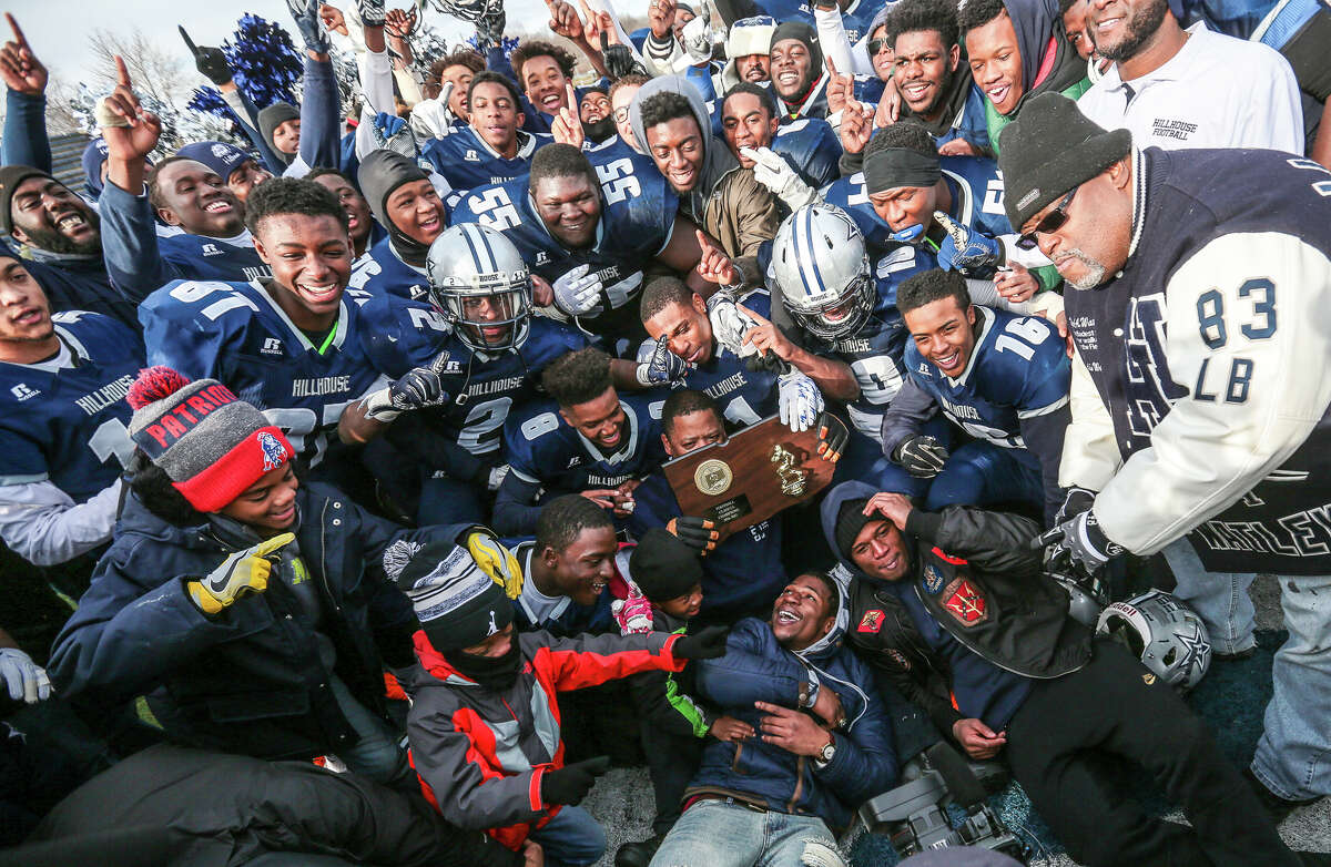 The Hillhouse football team celebrates their 42-21 win over St Joseph’s Saturday for the CIAC Class M State championship in West Haven-John Vanacore/New Haven Register