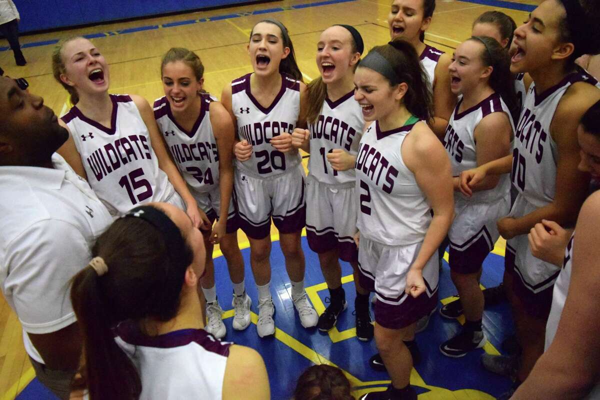 The Bethel girls basketball team celebrates its first ever South-West Conference championship on Wednesday at Newtown High School. (Derek Turner/GameTimeCT)