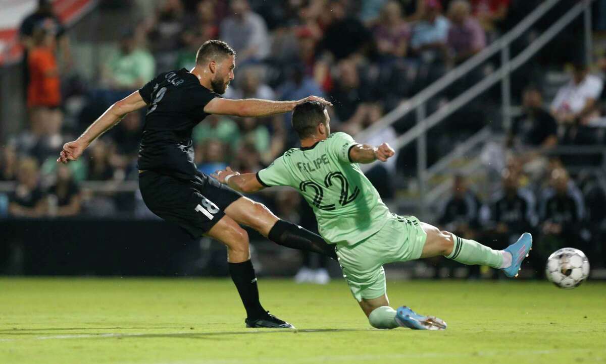 San Antonio FC Elliot Collier (18) drives the ball past Austin FC Felipe (22) in first half action. San Antonio FC hosts MLS club Austin FC in a third-round match of the Lamar Hunt U.S. Open Cup on Wednesday, April 20,2022 at Toyota Field.