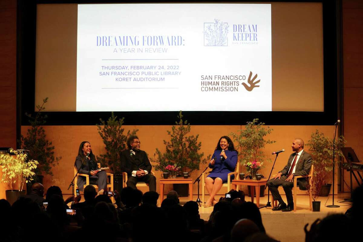 Human Rights Commission Director Sheryl Evans Davis (left) moderates 'Dreaming Forward: A Year in Review' with Cornel West, Mayor of London Breed and Supervisory Board Chairman Shamann Walton in the Koret Auditorium from the San Francisco Public Library.