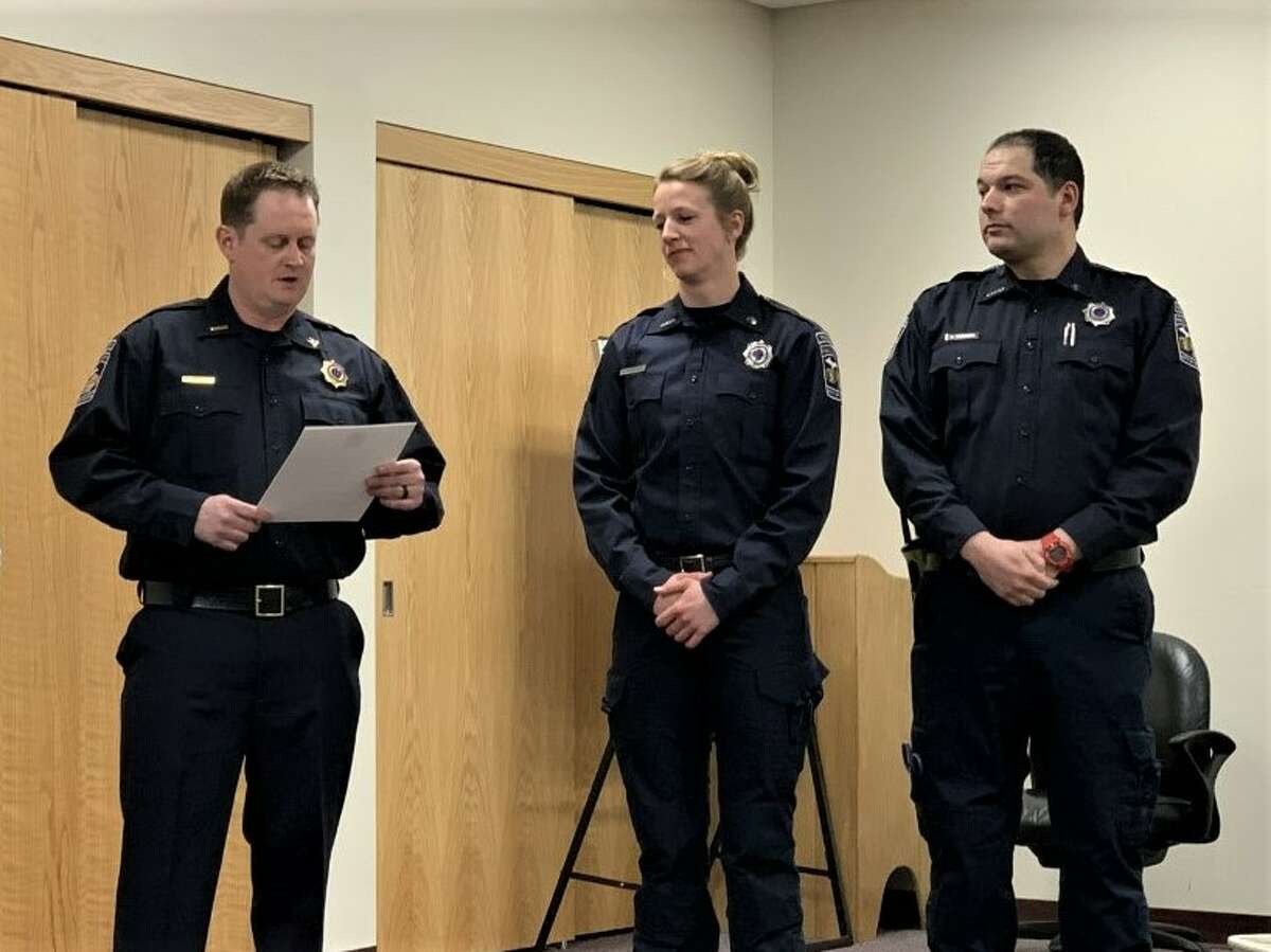 Captain Sean Wethington 9right) of the Big Rapids Fire Department presented the Life Saving Award to Firefighters Bethany Hamilton (center) and Cosme Monsivais (left) for heroic actions taken to save the life of an individual during an apartment fire on the Ferris State University campus in January 2021.