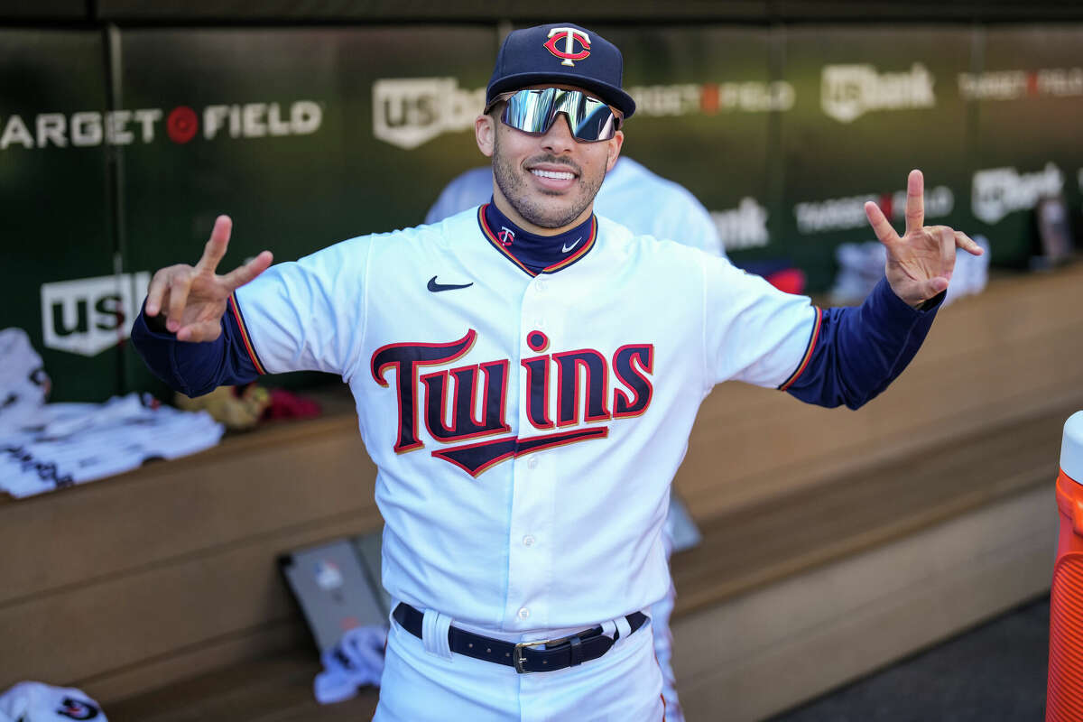 Carlos Correa of the Minnesota Twins looks on and poses for a photo prior to the game against the Seattle Mariners on April 8, 2022 at Target Field in Minneapolis, Minnesota.