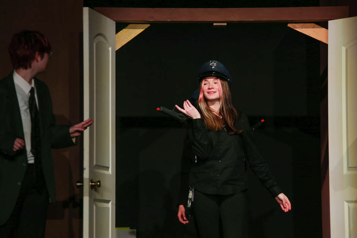 Meridian students act out a scene during a dress rehearsal for Meridian Early College High School's production of Clue Wednesday, April 20, 2022 at the school's auditorium.