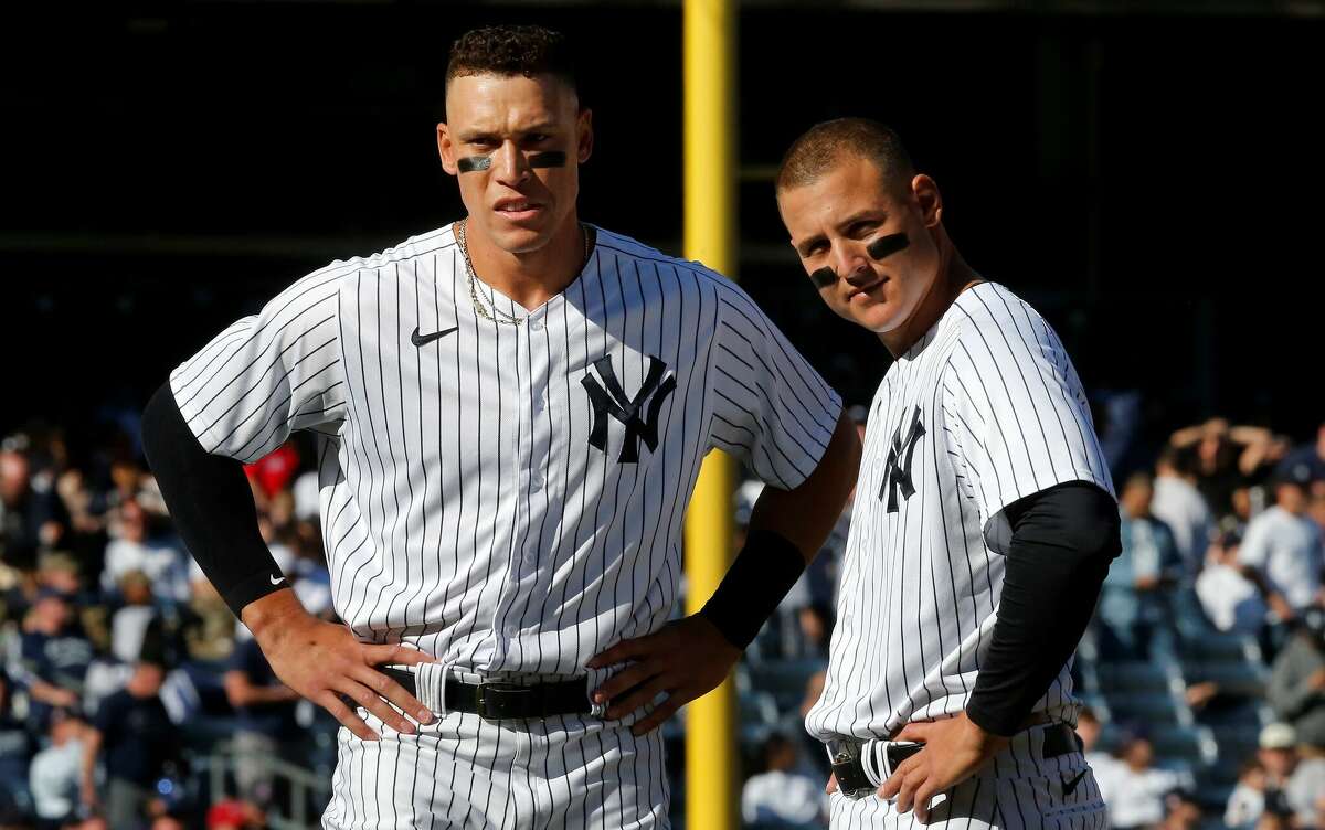 Aaron Judge (left) and Anthony Rizzo of the New York Yankees look on against the Boston Red Sox at Yankee Stadium on April 8, 2022 in New York City.