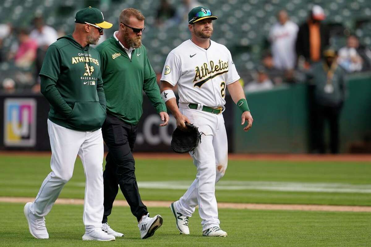 Oakland Athletics reinstate Stephen Vogt from injured list. Oakland Athletics first baseman Stephen Vogt, right, walks off the field with manager Mark Kotsay, left, and a trainer during the eighth inning of a baseball game against the Baltimore Orioles in Oakland, Calif., Wednesday, April 20, 2022. (AP Photo/Jeff Chiu)