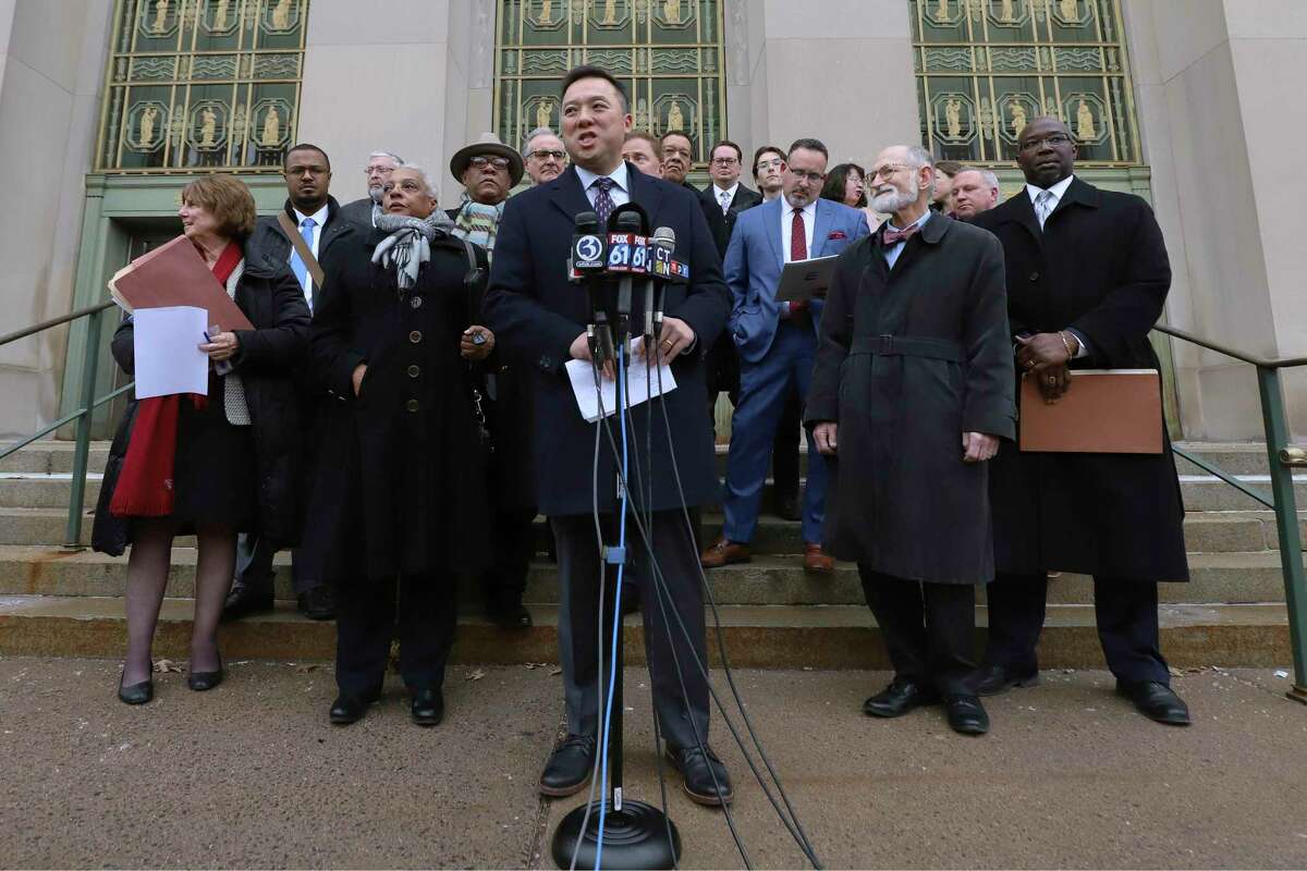 Connecticut Attorney General William Tong speaks outside the Connecticut Supreme Court on the new agreements reached in the long-running Sheff v. O'Neill school desegregation case, Friday, Jan. 10, 2020, in Hartford.