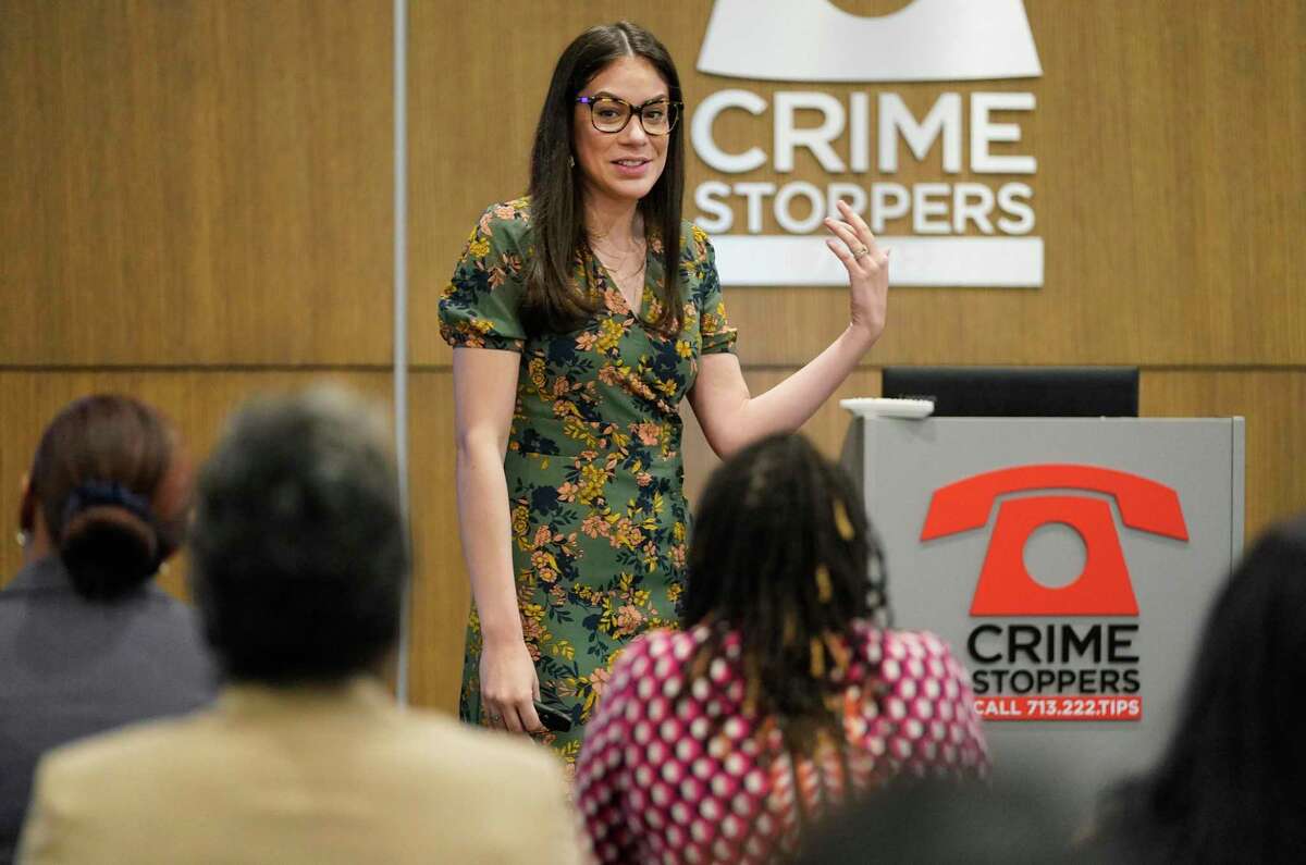 Sydney Zuiker, safe community program director, speaks during a human trafficking presentation at Crime Stoppers, 3001 Main St., Thursday, March 17, 2022, in Houston.